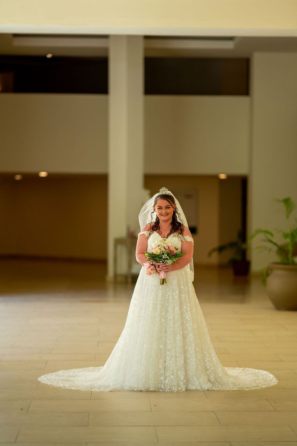 Couple dancing on pier by the water